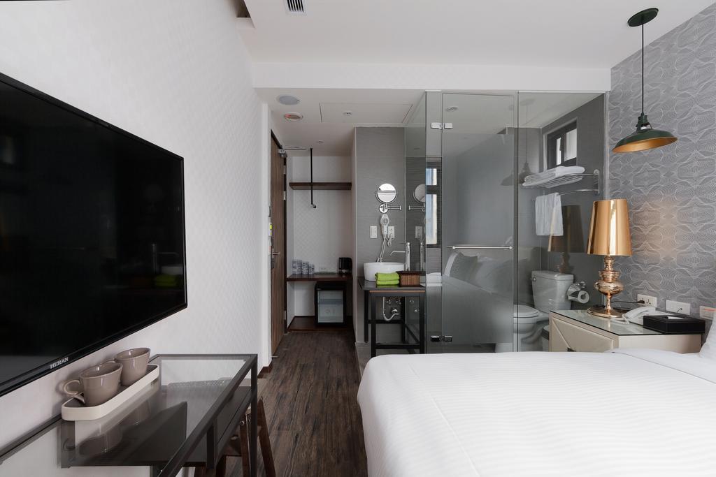 Herb Art Hotel Цзилун Номер фото